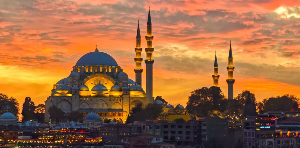 Mosque domes and minarets at sunset in Istanbul, Turkey